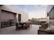 Outdoor kitchen and dining area perfect for entertaining at 10948 E Rising Sun Dr, Scottsdale, AZ 85262