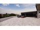 Two-car garage with a modern design and ample parking space at 10948 E Rising Sun Dr, Scottsdale, AZ 85262