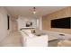 Open concept game room with large TV and comfortable furniture at 10948 E Rising Sun Dr, Scottsdale, AZ 85262