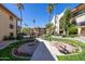 Landscaped courtyard with walking paths and benches at 10330 W Thunderbird Blvd # B201, Sun City, AZ 85351