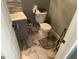 Small bathroom with a toilet, sink, and tiled floor at 2474 E Westchester Dr, Chandler, AZ 85249