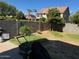 Backyard with grassy area and trees at 2474 E Westchester Dr, Chandler, AZ 85249