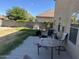 Small patio with table and chairs at 2474 E Westchester Dr, Chandler, AZ 85249