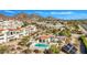 Community pool and tennis court with mountain views at 3800 E Lincoln Dr # 42, Phoenix, AZ 85018