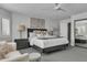 Bright bedroom with a queen bed and ensuite bathroom at 3800 E Lincoln Dr # 42, Phoenix, AZ 85018