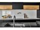 Stylish kitchen boasting modern appliances and clean lines at 3800 E Lincoln Dr # 42, Phoenix, AZ 85018