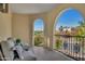 Relaxing patio with arched openings and scenic views at 3800 E Lincoln Dr # 42, Phoenix, AZ 85018