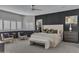 Bright bedroom with a plush bed and modern nightstands at 3800 E Lincoln Dr # 42, Phoenix, AZ 85018