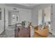 Home office with built-in desk and access to a patio at 3800 E Lincoln Dr # 42, Phoenix, AZ 85018