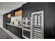 Sleek kitchen featuring stainless steel appliances and ample cabinetry at 3800 E Lincoln Dr # 42, Phoenix, AZ 85018
