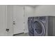 Laundry room with washer, dryer, and exterior access at 3800 E Lincoln Dr # 42, Phoenix, AZ 85018