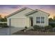 Craftsman style home with a two car garage and neutral colors at 4065 E Ghost Flower Ln, San Tan Valley, AZ 85140