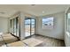 Bright dining area with sliding glass doors leading to the backyard at 22865 E Roundup Way, Queen Creek, AZ 85142