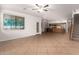 Open living room, kitchen, and staircase view at 13029 W Campbell Ave, Litchfield Park, AZ 85340