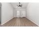 Bright living room featuring LVP flooring and a ceiling fan at 455 S Delaware Dr # 120, Apache Junction, AZ 85120