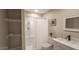 Clean bathroom with shower, shelves and vanity at 3131 W Elm St, Phoenix, AZ 85017