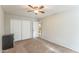 Bright bedroom with double door closet and access to the bathroom at 2221 E Frye Rd, Chandler, AZ 85225