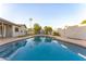 Relaxing kidney shaped pool in the backyard at 2221 E Frye Rd, Chandler, AZ 85225