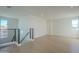 Spacious bonus room with hardwood floors and large windows at 2130 E Turney Ave # 4, Phoenix, AZ 85016