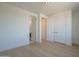Simple bedroom with access to bathroom and closet at 2130 E Turney Ave # 4, Phoenix, AZ 85016