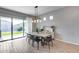 Modern dining area with sliding glass doors leading to the backyard at 2925 W Lynx Dr, San Tan Valley, AZ 85144