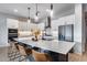 Spacious kitchen featuring a large island, modern appliances, and white cabinets at 2925 W Lynx Dr, San Tan Valley, AZ 85144