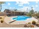 Sparkling pool with a diving board, surrounded by desert landscaping at 30120 N 70Th St, Scottsdale, AZ 85266