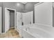 Bathroom with a large soaking tub and walk-in shower at 3514 E Parkview Dr, Gilbert, AZ 85295