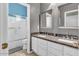 Bathroom with double sinks, granite countertops, and a separate shower and tub at 3514 E Parkview Dr, Gilbert, AZ 85295
