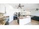 Island kitchen with granite countertops and stainless steel appliances at 7585 W Tumblewood Dr, Peoria, AZ 85382