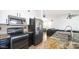 Modern kitchen with granite countertops and stainless steel appliances at 7585 W Tumblewood Dr, Peoria, AZ 85382