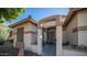 Covered entrance with a decorative arch and string lights at 7585 W Tumblewood Dr, Peoria, AZ 85382
