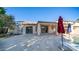 Covered patio and spacious backyard with a pool at 7585 W Tumblewood Dr, Peoria, AZ 85382
