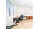 Bright home office with built-in desk and cabinets, offering ample workspace at 7585 W Tumblewood Dr, Peoria, AZ 85382
