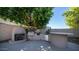 Outdoor kitchen with built-in grill and fireplace at 7585 W Tumblewood Dr, Peoria, AZ 85382