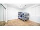 Cozy bedroom featuring a bunk bed and mirrored closet, perfect for or guests at 7585 W Tumblewood Dr, Peoria, AZ 85382