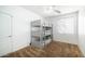Spacious bedroom with a triple bunk bed at 7585 W Tumblewood Dr, Peoria, AZ 85382