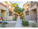 Community walkway with landscaping and building exteriors at 2150 W Alameda Rd # 1165, Phoenix, AZ 85085