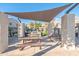 Community BBQ area with shaded seating at 2150 W Alameda Rd # 1165, Phoenix, AZ 85085