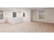 Open loft area with carpet, multiple windows, and built-in seating at 2660 S 172Nd Dr, Goodyear, AZ 85338