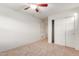 Spacious bedroom with neutral carpet and large closet at 2660 S 172Nd Dr, Goodyear, AZ 85338