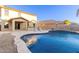 Inviting kidney shaped pool with patio and lounge chairs at 2660 S 172Nd Dr, Goodyear, AZ 85338