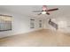 Spacious living room with tile floors and staircase at 2660 S 172Nd Dr, Goodyear, AZ 85338