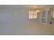 Spacious dining room with tile floors and built-in shelving at 18071 W Douglas Way, Surprise, AZ 85374
