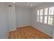 Light and airy bedroom with laminate wood flooring at 18071 W Douglas Way, Surprise, AZ 85374