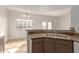 Kitchen features a double sink and granite countertops at 6705 W Orchid Ln, Peoria, AZ 85345