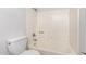 Clean bathroom featuring a toilet and shower/tub combo at 6705 W Orchid Ln, Peoria, AZ 85345