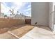 Fenced-in backyard with patio and landscaping at 6705 W Orchid Ln, Peoria, AZ 85345