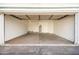 Attached garage with ample space for parking and storage at 6705 W Orchid Ln, Peoria, AZ 85345