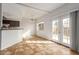Bright dining area with tile floors and access to a patio at 6705 W Orchid Ln, Peoria, AZ 85345